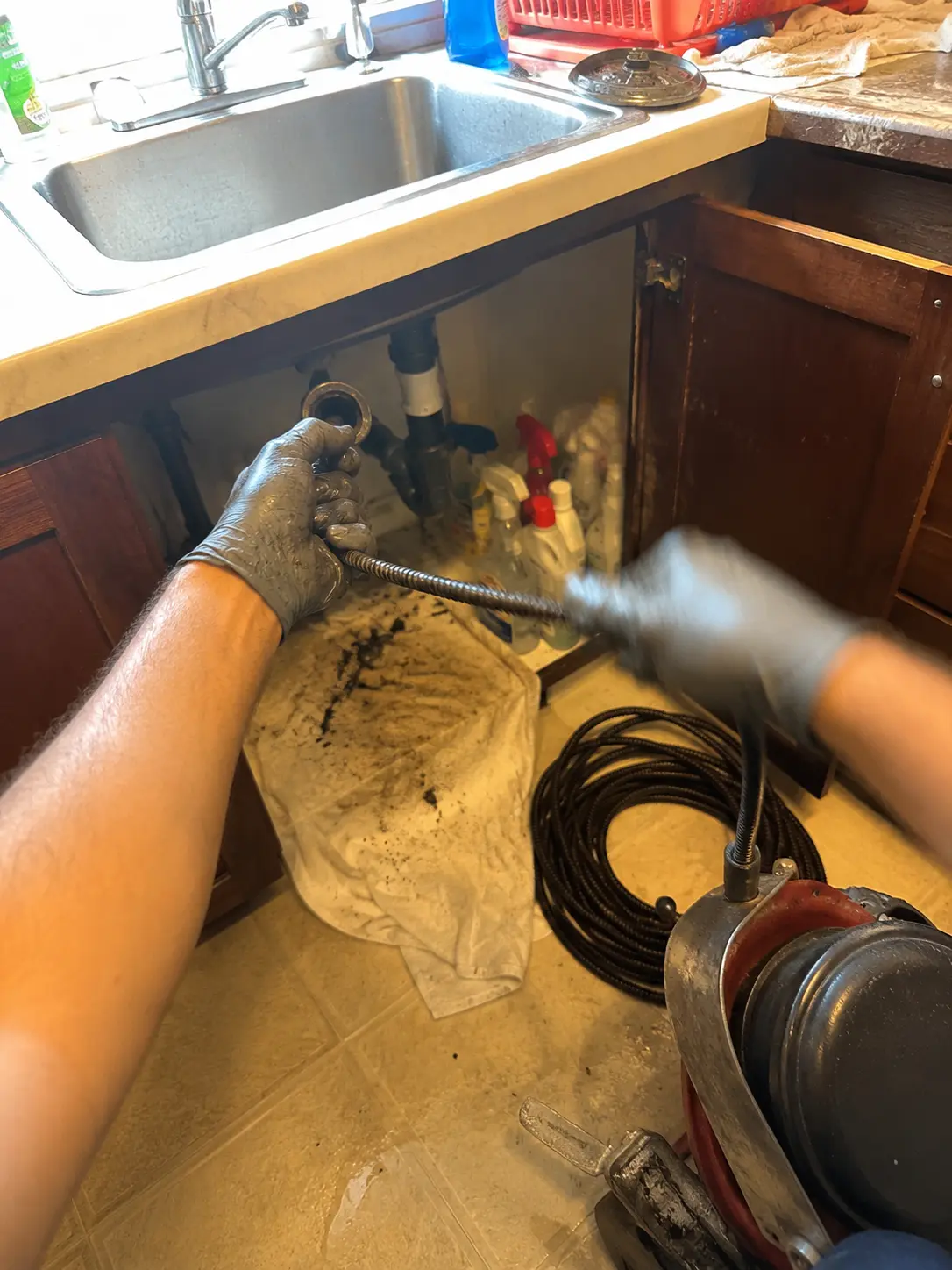 emergency plumber arriving at a Brooklyn apartment at night