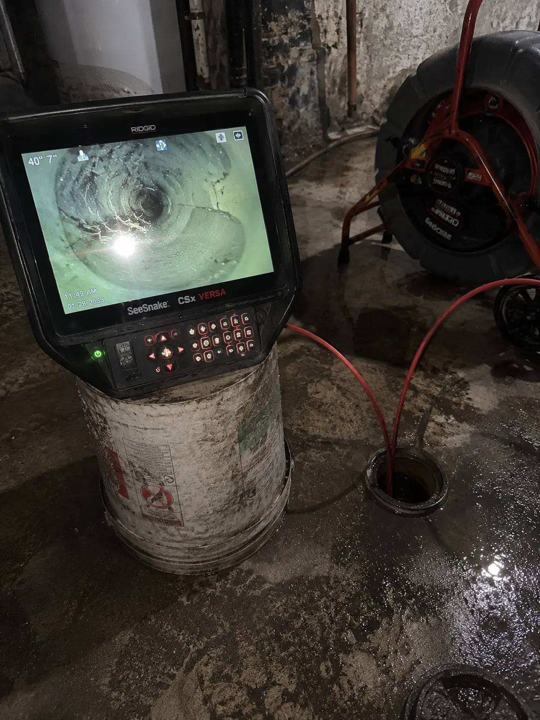 plumber pressure testing a gas line with a gauge